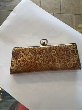 Vtg eyeglasses case or tiny clutch golds.